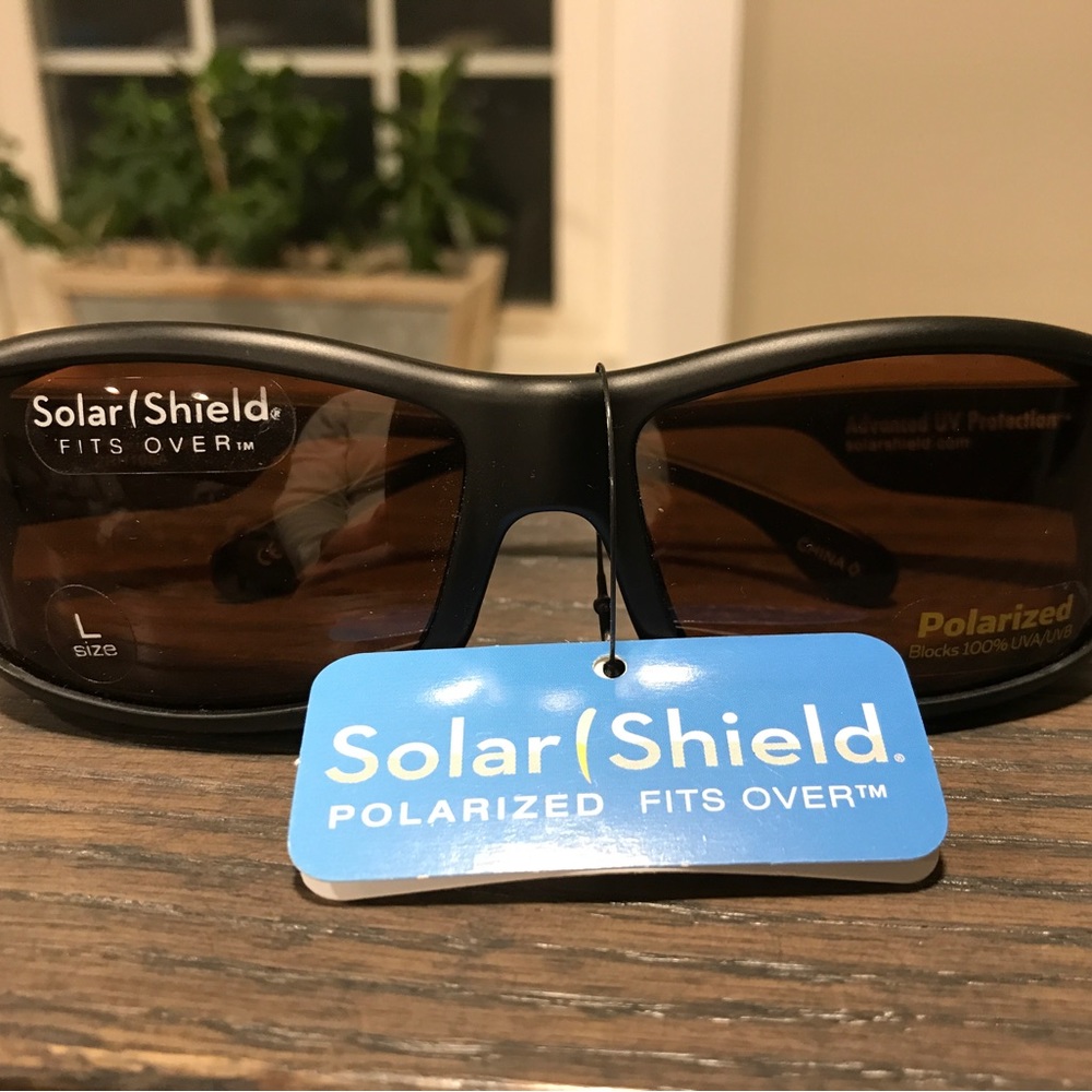 Solar Shield polarized fits over glasses